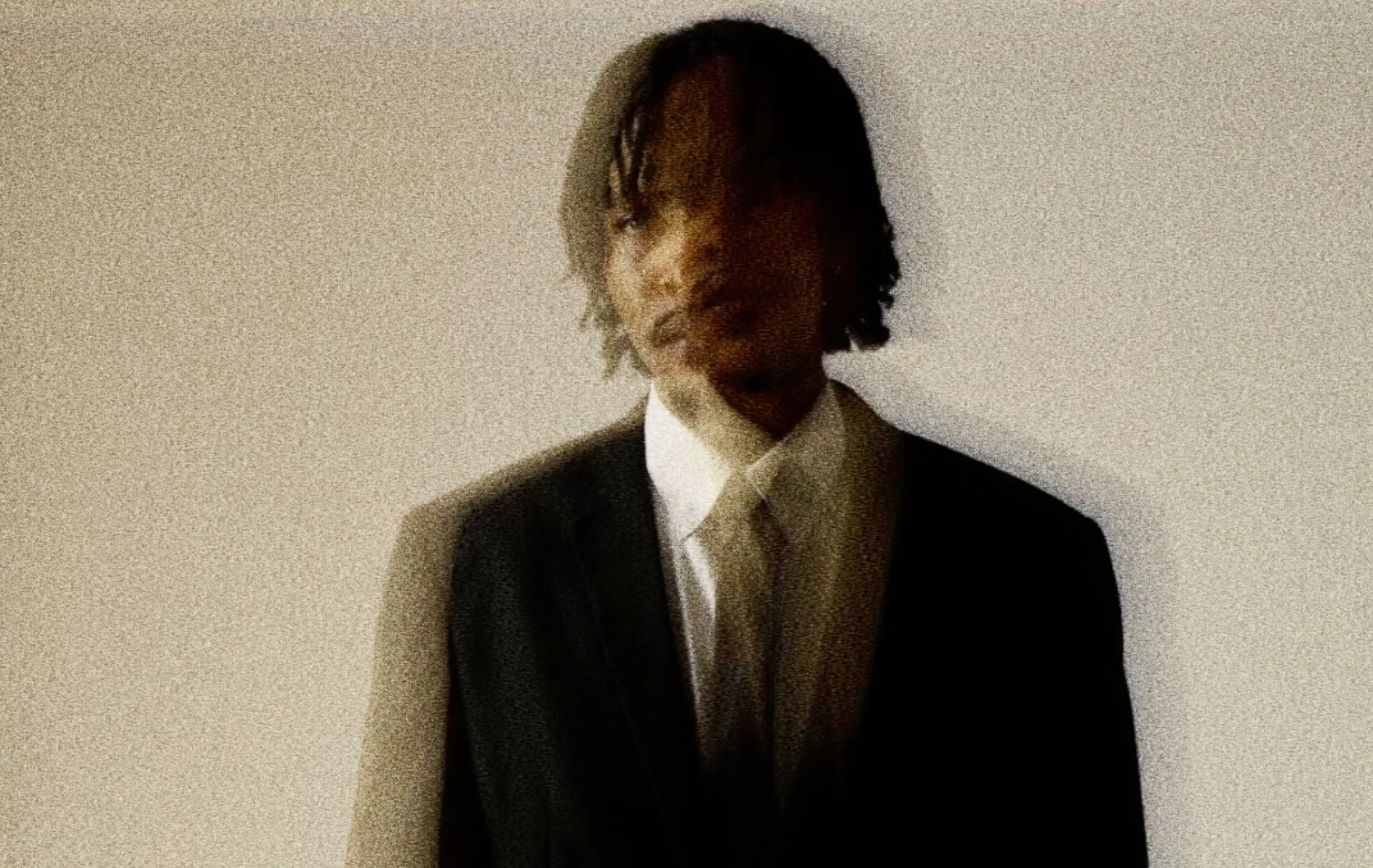 Abstract motion portrait of HIGHBREED in a suit
